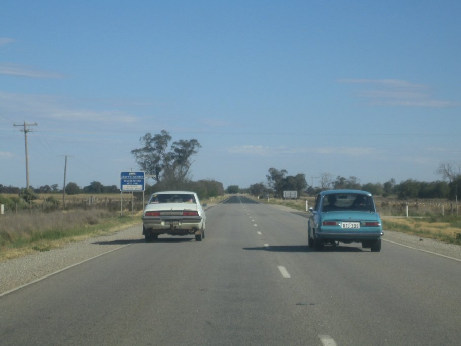 Bellett Nationals 06 - Ross overtaking a very slow Corona Mark II.JPG