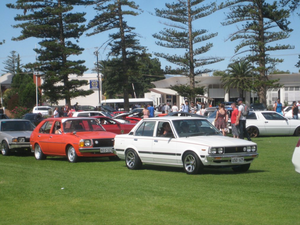 Toyota KE70 Corolla with JDM front & Supra alloys - with Mazda 323.JPG